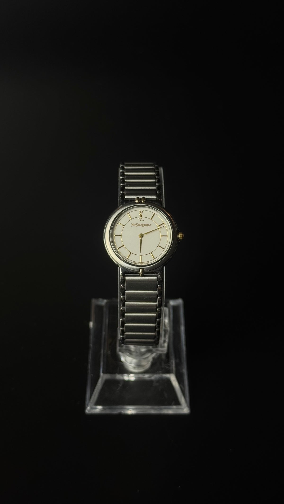 Yves Saint Laurent YSL – biała tarcza, srebrna bransoleta