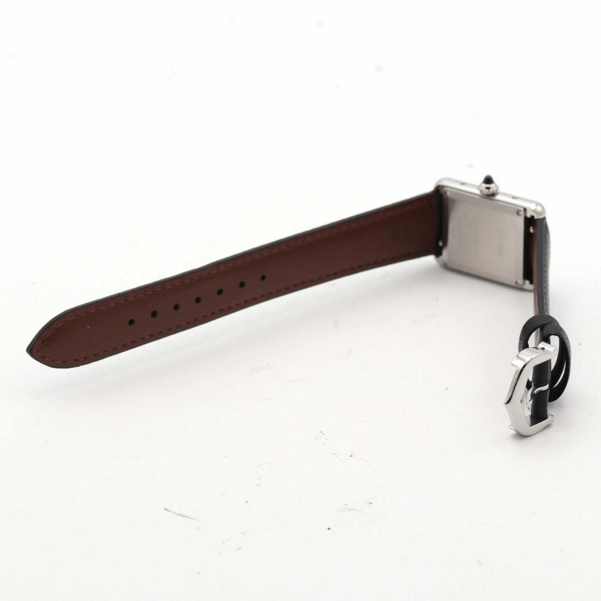 Cartier Tank Must SM WSTA0042 – srebrna tarcza z rzymskimi cyframi, czarny pasek