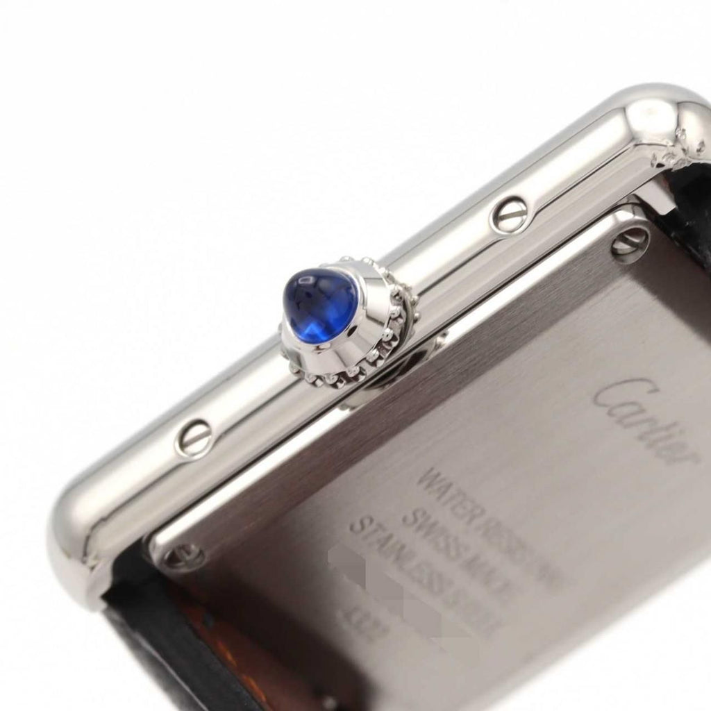 Cartier Tank Must SM WSTA0042 – srebrna tarcza z rzymskimi cyframi, czarny pasek