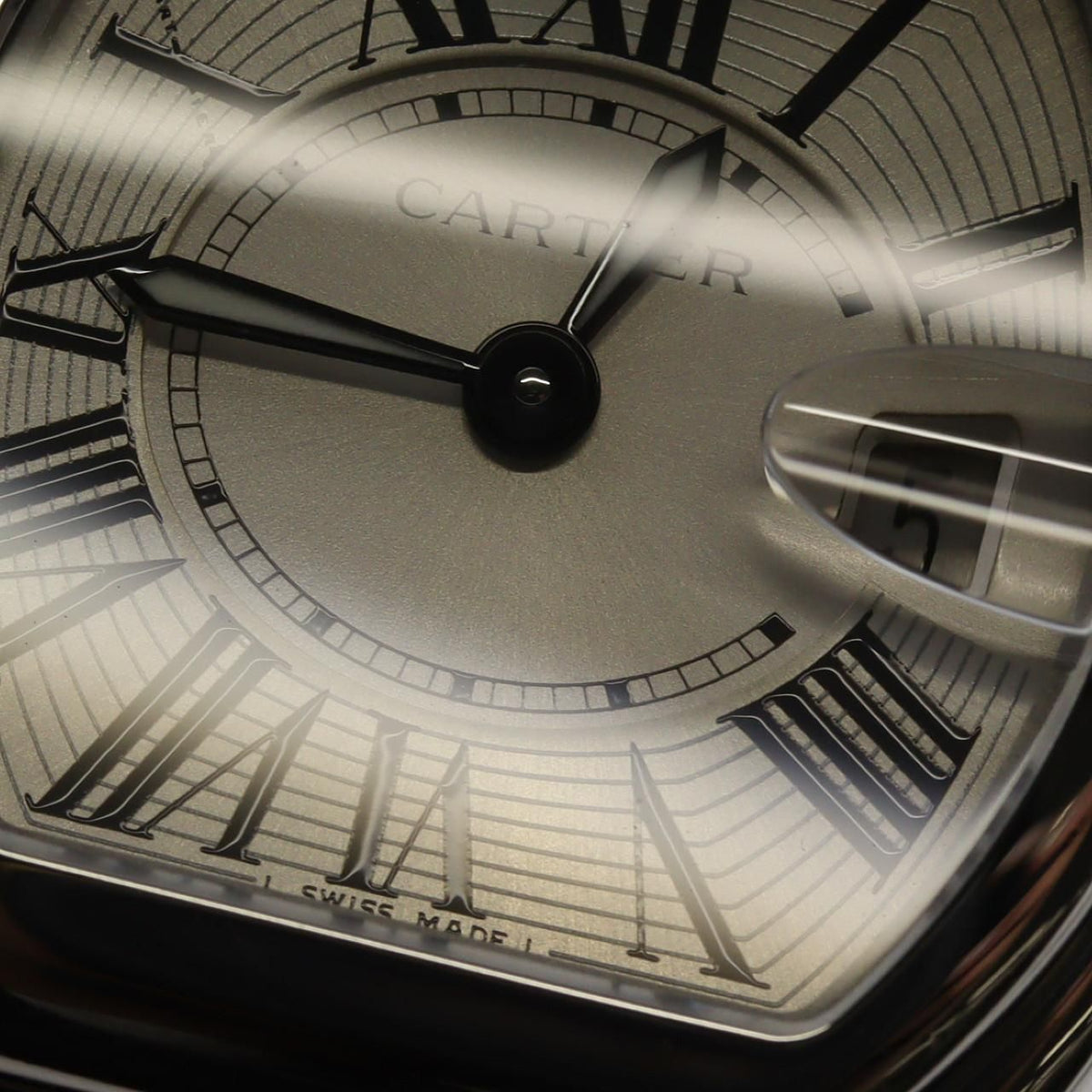 Cartier Roadster SM W62016V3 – srebrna tarcza z rzymskimi cyframi, stalowa bransoleta