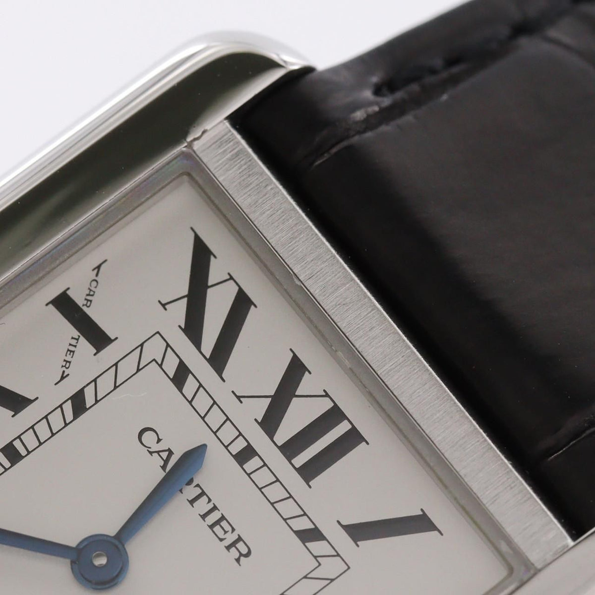 Cartier Tank Solo SM WSTA0030 – srebrna tarcza z rzymskimi cyframi, czarny pasek