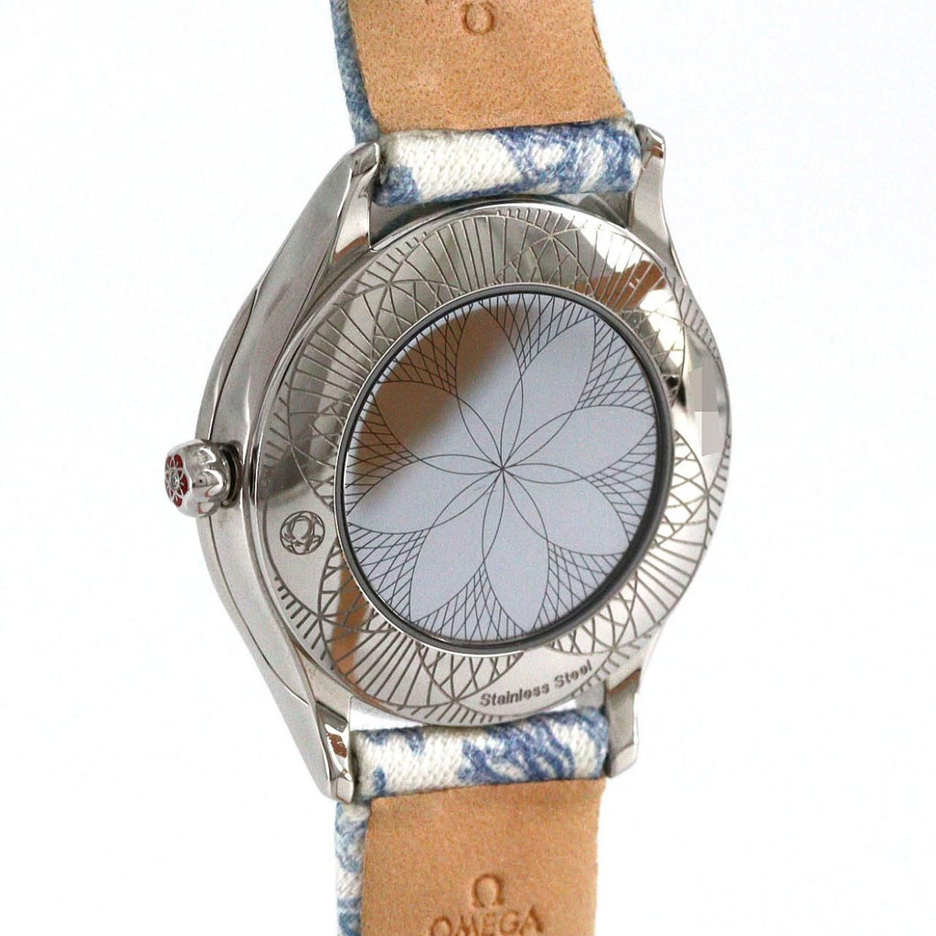 Omega De Ville Mini Trésor 428.17.26.60.04.001 – biała tarcza, diamenty, komplet z dodatkowym paskiem