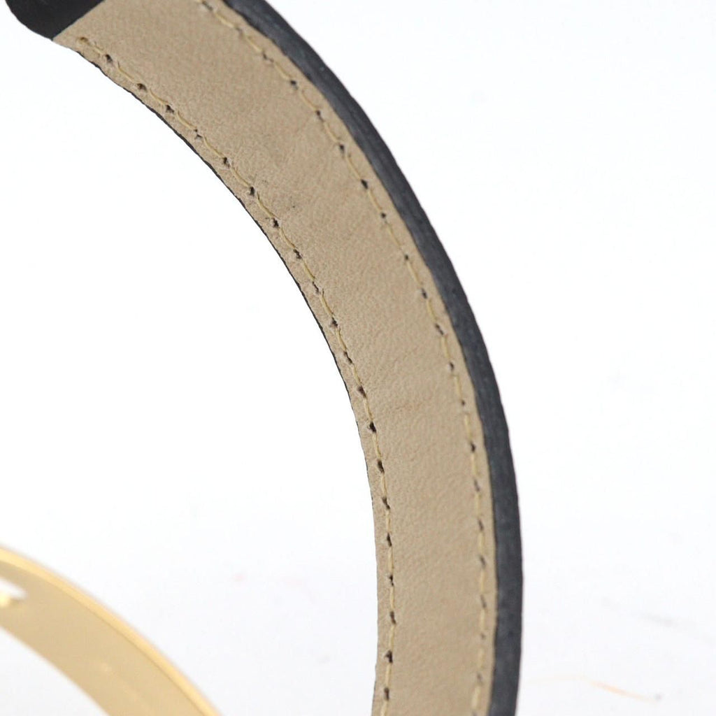 Cartier Must Colisée SM W1006654 – złocona koperta, czarny pasek