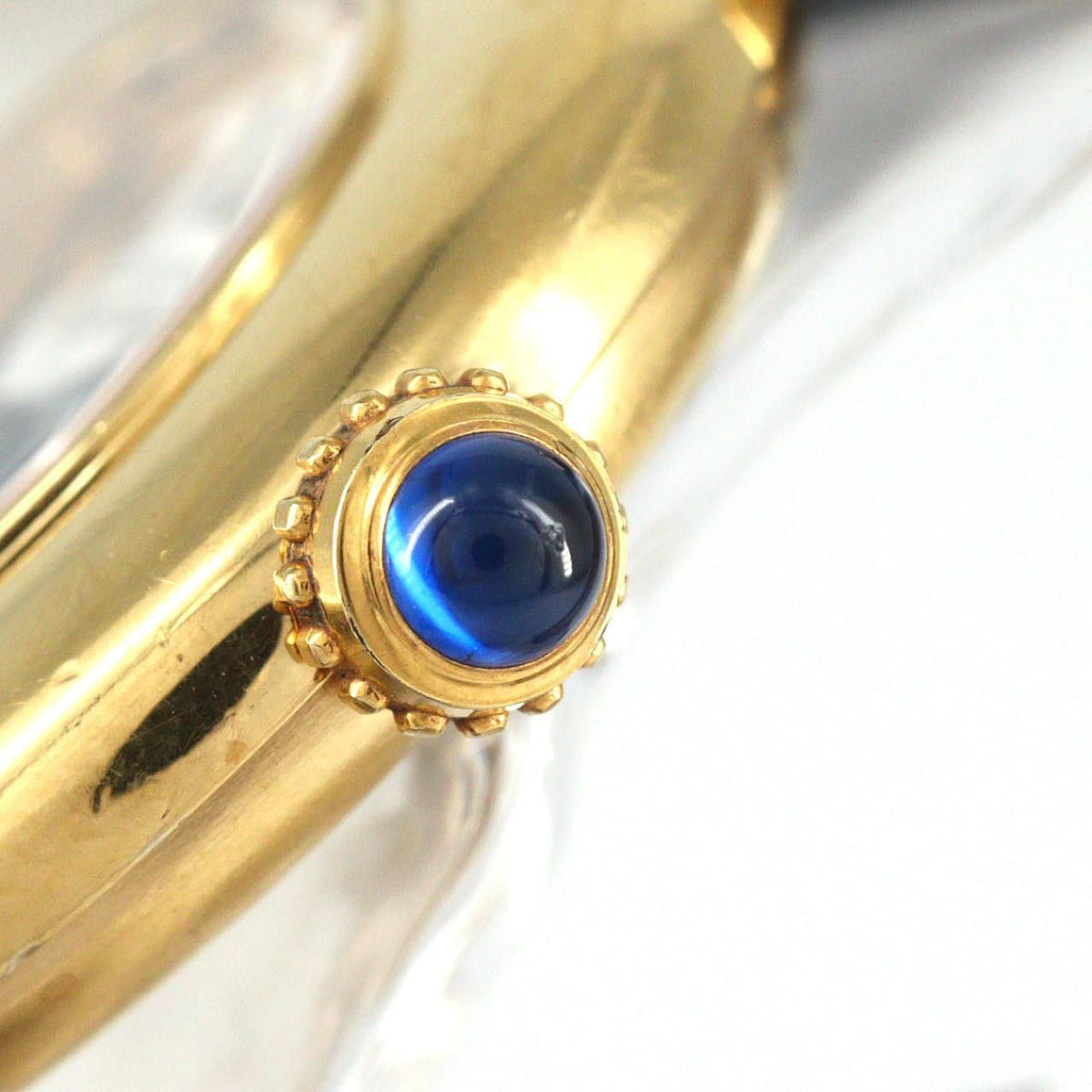 Cartier Must Colisée SM W1006654 – złocona koperta, czarny pasek