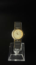Yves Saint Laurent – zegarek vintage ze złotą tarczą na srebrno-złotej bransolecie