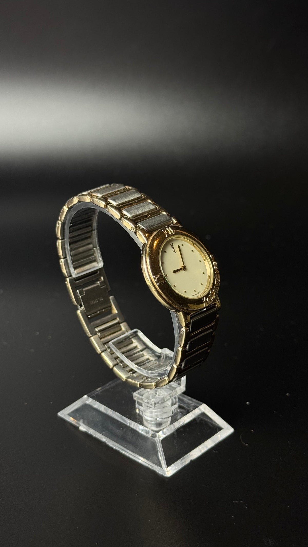 Yves Saint Laurent YSL – kremowa tarcza, dwukolorowa bransoleta