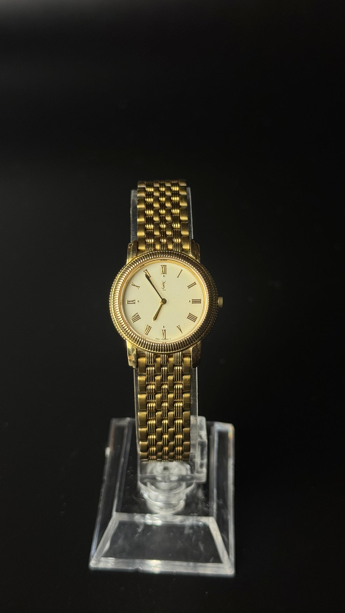 Yves Saint Laurent – zegarek vintage w złotym kolorze z rzymskimi cyframi i ozdobną bransoletą