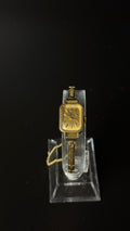 Omega – prostokątny zegarek vintage w złotym kolorze na ozdobnej bransolecie