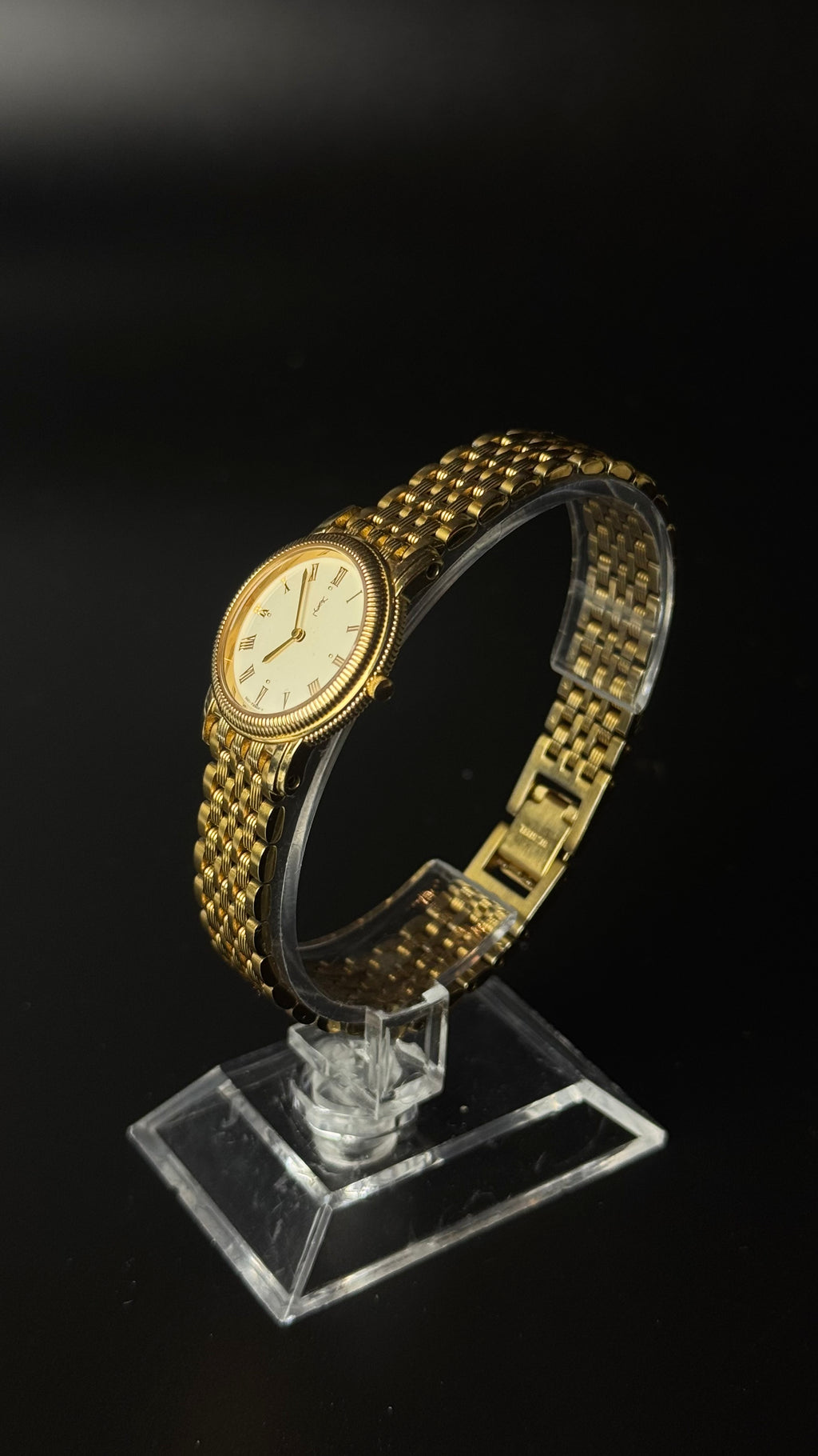 Yves Saint Laurent – zegarek vintage w złotym kolorze z rzymskimi cyframi i ozdobną bransoletą