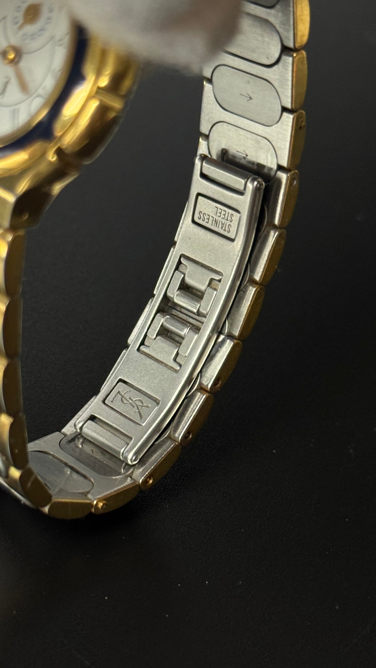Yves Saint Laurent YSL – kremowa tarcza, granatowy bezel
