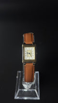 Yves Saint Laurent – prostokątny zegarek vintage na koniakowym pasku